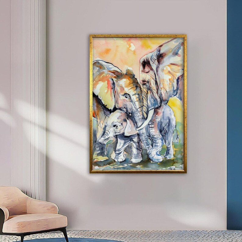 May include: A watercolor painting of three elephants, two adults and a baby, standing close together. The elephants are painted in shades of gray, brown, and white, with a soft, dreamy background.