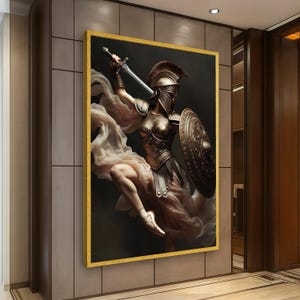 May include: A framed wall art print depicting a warrior in bronze-toned armor, a plumed helmet, and a round shield, holding a sword aloft. The figure wears flowing, light-colored fabric and ballet slippers, captured in a dynamic, leaping pose.