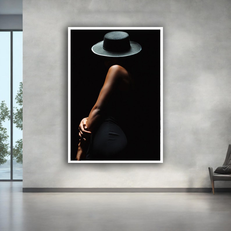 May include: A silhouette of a person wearing a black hat against a dark background.