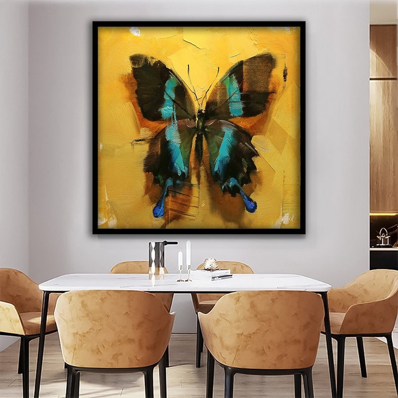 May include: A painting of a blue and black butterfly with yellow wings on a yellow background.