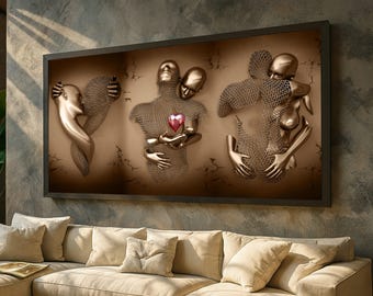 May include: A framed wall art piece featuring three bronze-colored sculptures of embracing figures. The central sculpture holds a red heart. The figures are partially formed with a chainmail-like texture, set against a textured brown background.