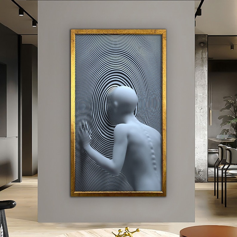 Puede incluir: Una impresi&oacute;n de arte abstracto enmarcada que presenta una representaci&oacute;n 3D de la espalda de una persona con un patr&oacute;n en espiral en blanco y negro detr&aacute;s de ella.