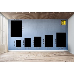 May include: A wall with a variety of canvas sizes displayed. The sizes are listed in inches and centimeters. The text "BIG CANVAS" is in a yellow box in the upper right corner of the image.