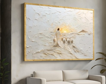 Könnte beinhalten: Ein strukturiertes Gemälde in einem goldenen Rahmen zeigt eine Figur in weißen Gewändern, die Schafe auf einen Sonnenuntergang zuführt. Das Kunstwerk hat einen 3D-Effekt, wobei sichtbare Pinselstriche Tiefe verleihen. Das Gemälde hat ein religiöses Thema.