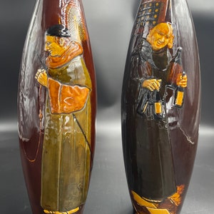 May include: A handmade wooden sign with the text "Welcome" in a playful font. The sign features a distressed white background and a dark stained wooden frame. A decorative floral element is in the corner.