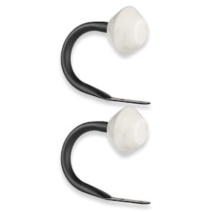 May include: Two black metal curtain tiebacks with white marble finials. The tiebacks have a simple, curved design and are perfect for adding a touch of elegance to any room.