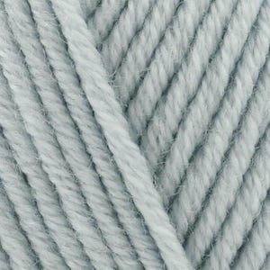May include: A close-up view of light blue yarn featuring a multi-ply twisted construction. The fibers show a soft, slightly fuzzy texture with consistent diagonal alignment across the frame, highlighting the individual strands of the spun thread.