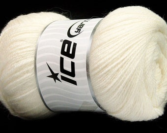 May include: A skein of off-white yarn with the brand name "ice" printed on a white and silver label. The yarn is tightly wound and appears soft and fluffy, ideal for knitting or crocheting projects.
