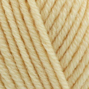 May include: A close-up view of cream-colored yarn, showcasing the twisted fiber construction and the soft, matte texture of the individual strands. The threads are arranged in parallel lines, highlighting the consistent ply and natural off-white hue.