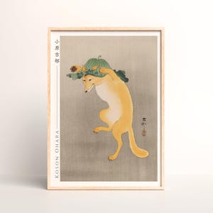 小原古邨作「蓮の葉の帽子をかぶった踊る狐」日本美術版画、木版画