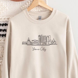 Sweatshirts with city names on them 2025