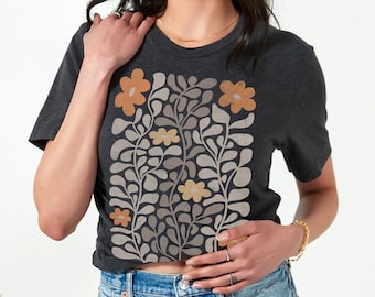 Camiseta unisex estilo boho con estampado botánico de flores silvestres.