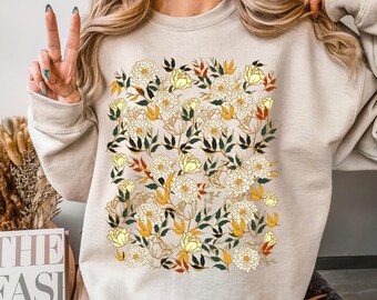 Sweater met wilde bloemen: unisex bloemenprint, minimalistisch design