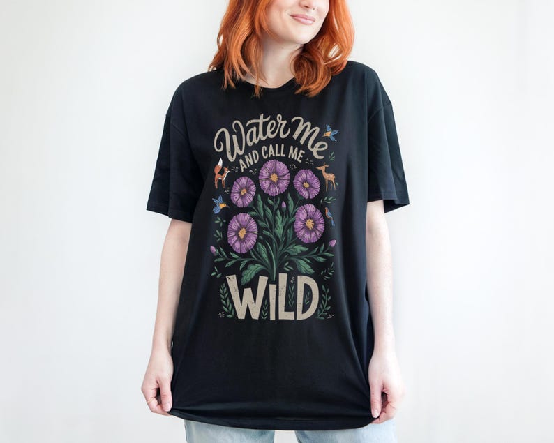 May include: Black t-shirt with a floral design and the text "Water me and call me wild".