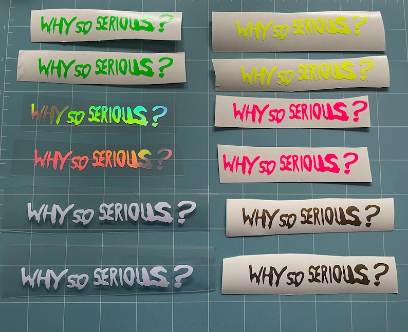 May include: Eight different vinyl stickers with the phrase "WHY SO SERIOUS?" in various colors and fonts. The stickers are on a blue background.