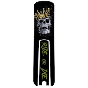 May include: Black and white skull graphic with a gold crown on a black background. The text "RIDE OR DIE" is written in green on the right side of the image.