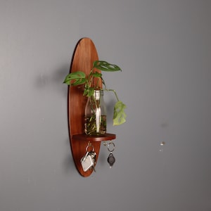 Solid modern timber oval wall shelf with Key hook / Magnetic key holder. Mid-Century floating shelf