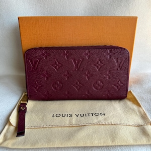 Cartera larga con cremallera LV auténtica