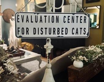 Disturbed Cats Evaluation Center Vintage Enamel Sign (4" x 12")