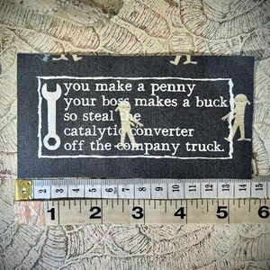 anti-work, anti-grind, anti-capitalist poem sew on punk patch green mummy fabric