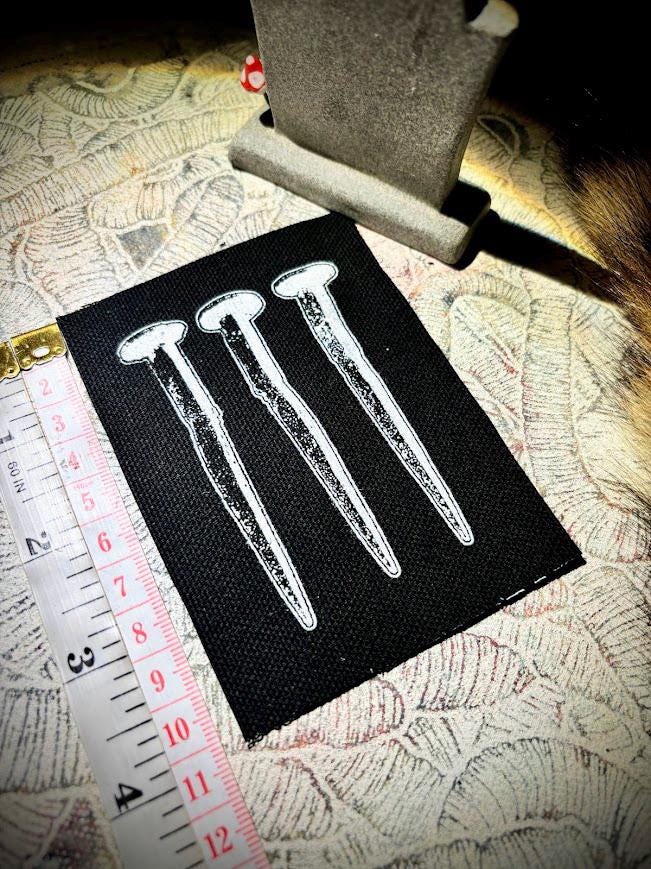 three coffin nails sew on crust punk patch