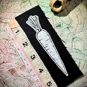 C'est une carotte à coudre sur un patch punk