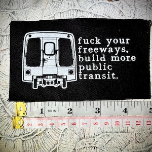F_uck your freeways, build more public transit sew on punk patch