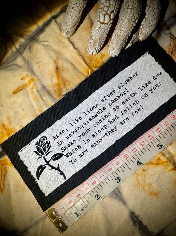 The mask of Anarchy poem punk patch rise like lions after slumber