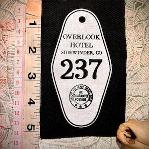Camera 237, chiave della camera dell'hotel Overlook, toppa punk da film horror