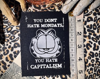 You don’t hate Mondays you hate capitalism with Garfield. For socialist punk battle vests, leftist crusty pant