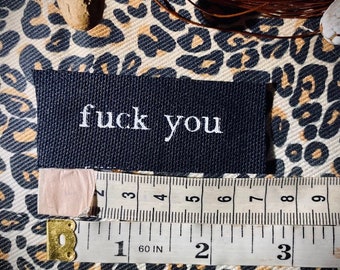 Tiny F_uck you mini sew on patch. so small it can be hidden anywhere, send one to your enemies. hand made, silk screened crust punk