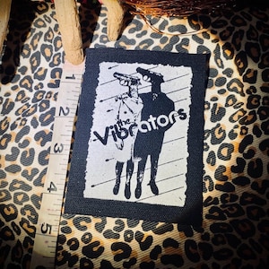 Parche para coser The Vibrators. Punk rock clásico, serigrafiado, hecho a mano. Punk londinense de los años 70 y 80 con el clásico cartel del espectáculo.