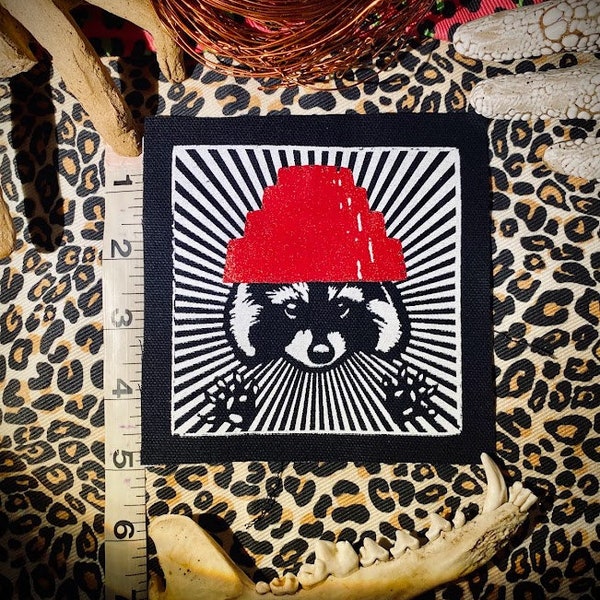 Are We Not Trashy? Raccoon with a Devo hat patch. 80's new wave/punk for battle vests, crusty pants, horror goth backpacks