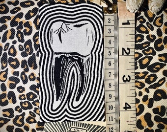 Toothache patch. cracked tooth patch with radiating pain lines. for toothy punk battle vests, crusty vests, horror goth backpacks