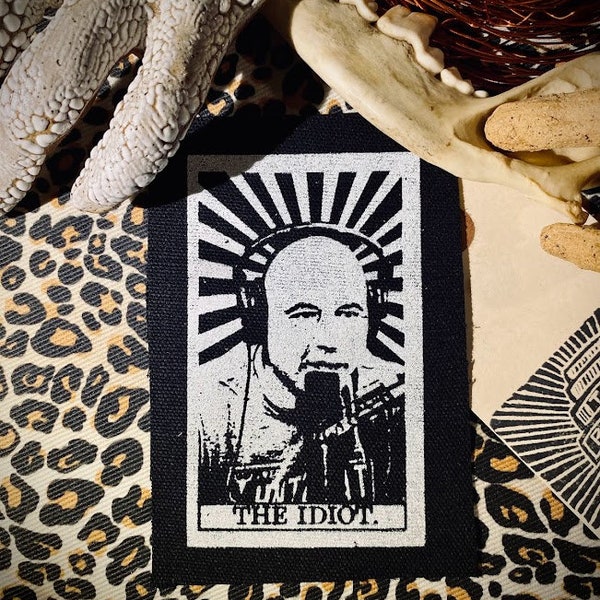 The Idiot tarot card patch featuring Joe Rogan. For crusty punk vests, pants, goth horror backpacks. Leftist, skeptic