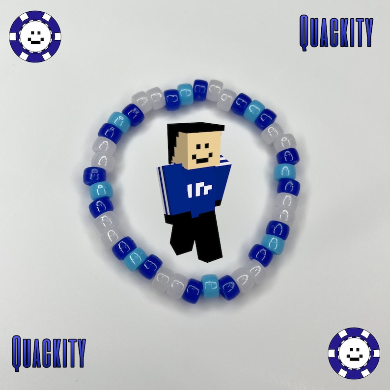 May include: A blue and white beaded bracelet with a pixelated character wearing a blue shirt with the letter "R" on it. The bracelet is in the shape of a circle and the character is in the center of the circle. The text "QUACKITY" is written in white letters on a black background at the top and bottom of the image.