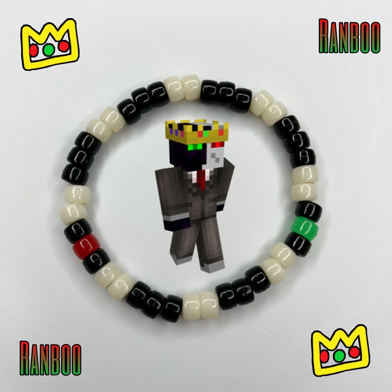 May include: A black and white beaded bracelet with red and green beads. The bracelet has a Minecraft character wearing a crown and a suit in the center. The text "RANBOO" is written on either side of the bracelet.