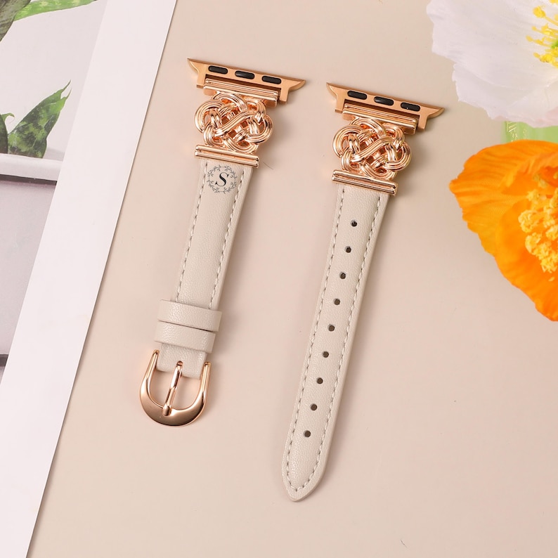 Rose gold hardware Apple Watch strap with cream leather and Celtic knot design, feminine and timeless