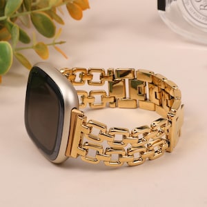gold metal chain link Fitbit Versa 4 band