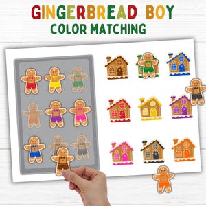 May include: A colour-matching game featuring gingerbread boys and houses. The game includes a tray of gingerbread men in various coloured shorts and bow ties. The matching houses are also in different colours. The text "GINGERBREAD BOY COLOR MATCHING" is at the top.