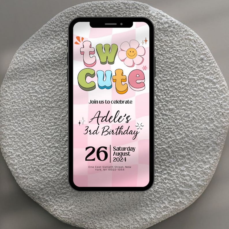 May include: A pink and white checkered phone screen with a colorful graphic that says "two cute" and a flower with a smiley face. The text below says "Join us to celebrate Adele's 3rd Birthday" and "26 Saturday August 2024". The address is "One East Sixtieth Street, New York, NY 10022-1054".