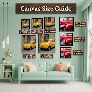The image is a living room with a green sofa and a wall displaying a canvas size guide for various car sizes. The guide provides measurements for different car sizes, including a yellow car, a red car, and a white car.