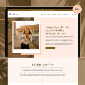 May include: A website design on a laptop screen with a light pink and brown color scheme. The website features the text "Elliot Lane" and "Helping Every Female Creative Find Her Authentic Purpose". There are also three sections labeled "Resources", "Portfolio", and "Offerings".