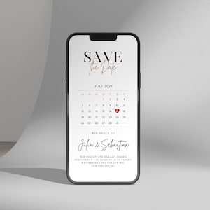 May include: A mobile phone screen shows a digital save-the-date announcement. The text "SAVE The Date" is in a stylish font. The calendar shows July 2027, with the 17th highlighted. Names "Julia & Sebastian" are featured below, along with additional text.