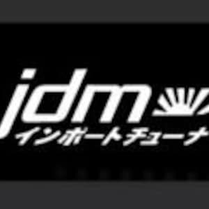 May include: Black rectangular graphic featuring the white text "jdm" and Japanese characters. The design includes a stylized sunburst and the words "Import Tuner".