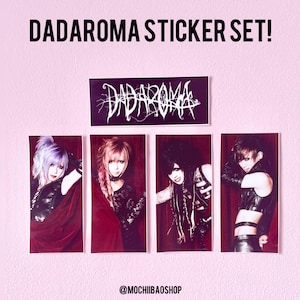 May include: A set of four stickers featuring black and white images of four people with long black hair. The stickers are on a pink background with the text "DADAROMA STICKER SET!" at the top and "@MOCHIBAOSHOP" at the bottom.