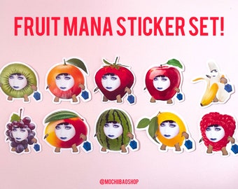 May include: A set of fruit-themed stickers featuring stylized faces. The stickers include a kiwi, orange, tomato, apple, banana, grapes, mango, watermelon, lemon, and raspberry. Each sticker has a unique fruit design and a blue bag. The text "FRUIT MANA STICKER SET!" is at the top.