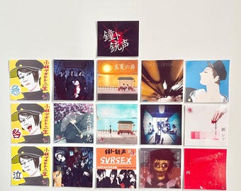 May include: A set of 12 stickers featuring various album covers from the Japanese rock band,  KANEKO JUUSEI. The stickers are printed on white paper with a glossy finish. The album covers feature a variety of images, including a sunset, a train station, and a portrait of a person. The stickers are arranged in a grid pattern on a white background. The text "KANEKO JUUSEI STICKER SET!" is printed in red at the top of the image. The text "@MOCHIIBAOSHOP" is printed in black at the bottom of the image.