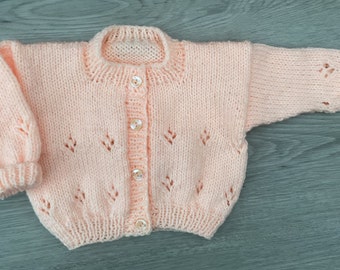 Hand knitted baby cardigan in Peach. 0-3 mths.