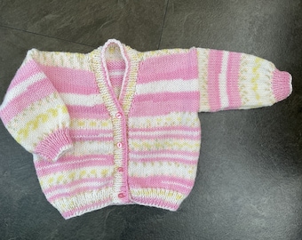 Hand knitted baby cardigan in Pink, Yellow & White. 1-2 yrs.